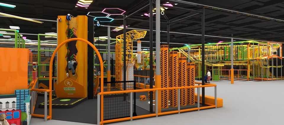 Rendering of an indoor climbing wall and multi-level ropes course
